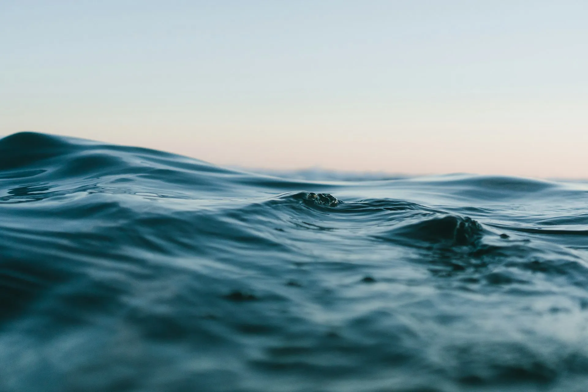 Calm ocean waters at dawn